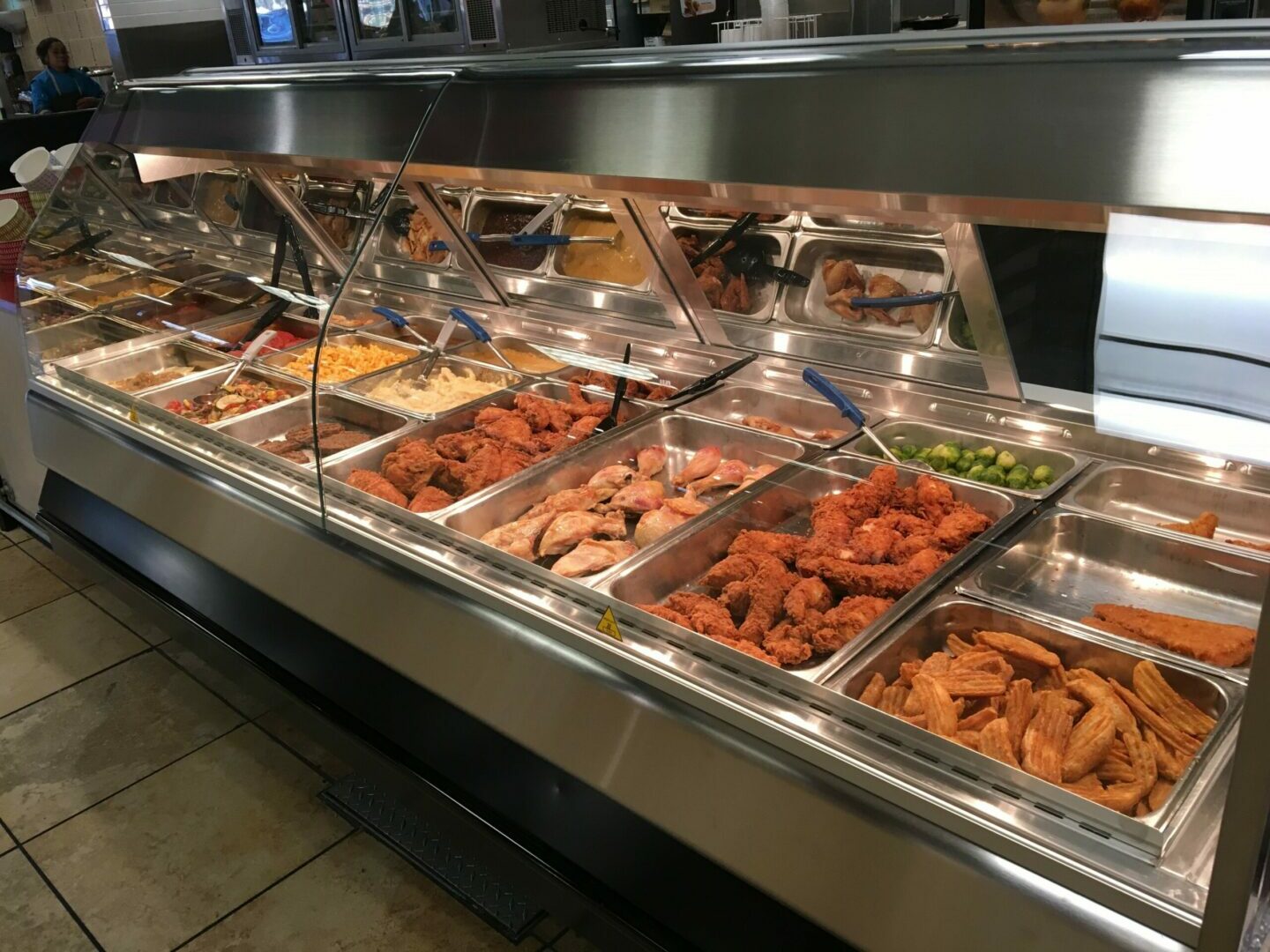 Different Food Items Displayed Behind Glass Cases